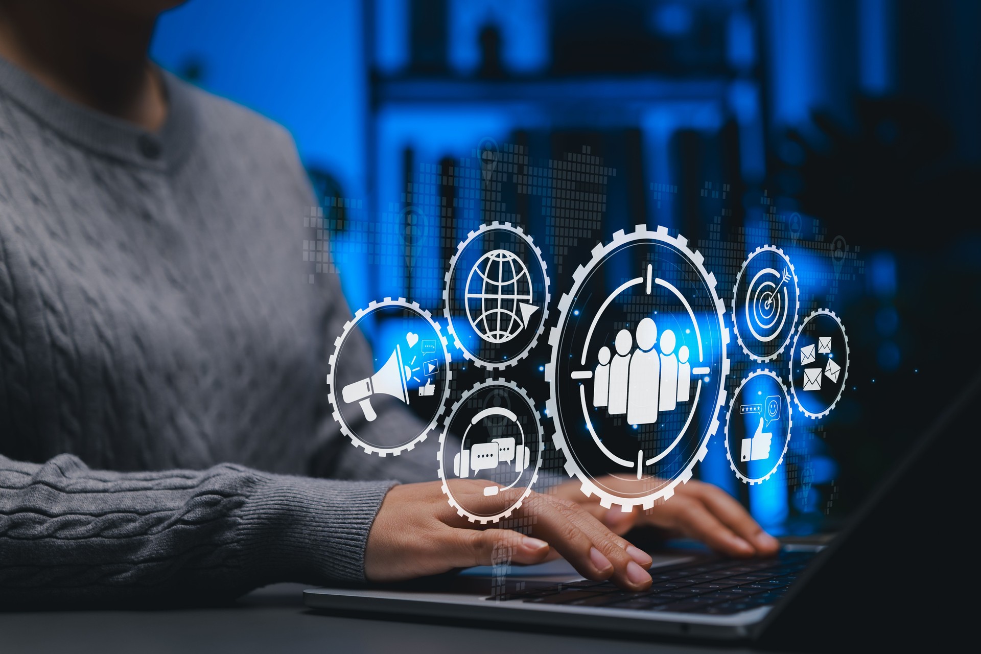 Digital Marketing and Target Audience Strategy Concept. Person using laptop with marketing icons like target audience, email, SEO, social media, representing market planning and customer engagement.